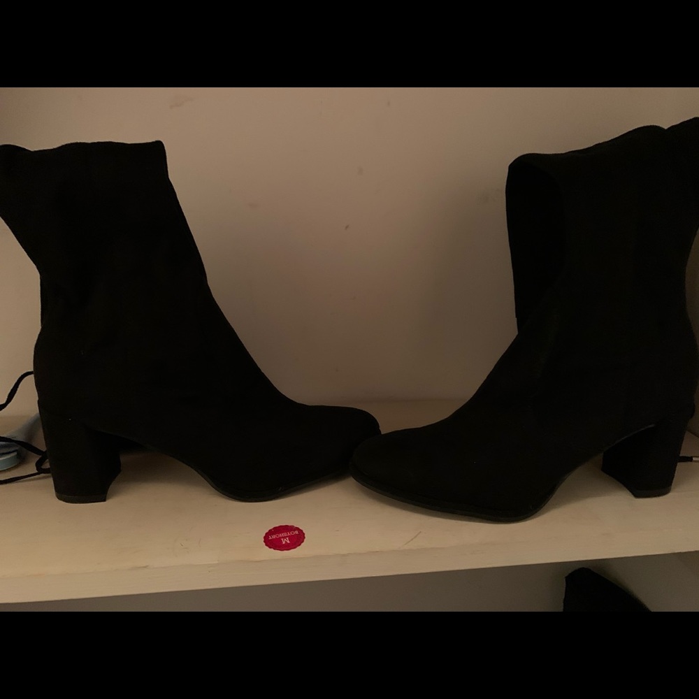 Over knee boots with a tie on the back